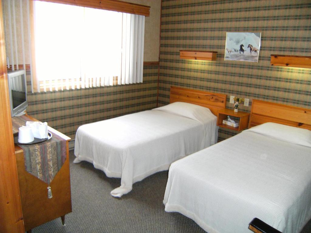 Hotel-Motel Les Voitures D'Eau Isle-aux-Coudres Ruang foto